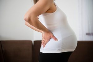 Боль в спине и крестце при беременности